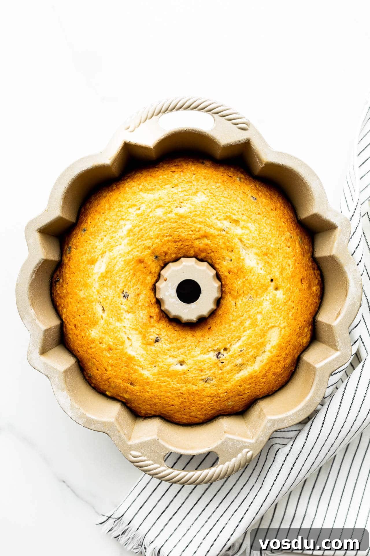 Freshly baked bundt cake in bundt pan before unmoulding.