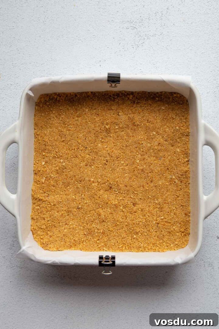 Cherry Delight: Homemade Cherry Dessert Recipes for Summer 6 graham cracker crust packed into a dish.