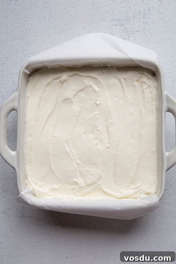 Cherry Delight: Homemade Cherry Dessert Recipes for Summer 9 cream cheese filling in a dish.