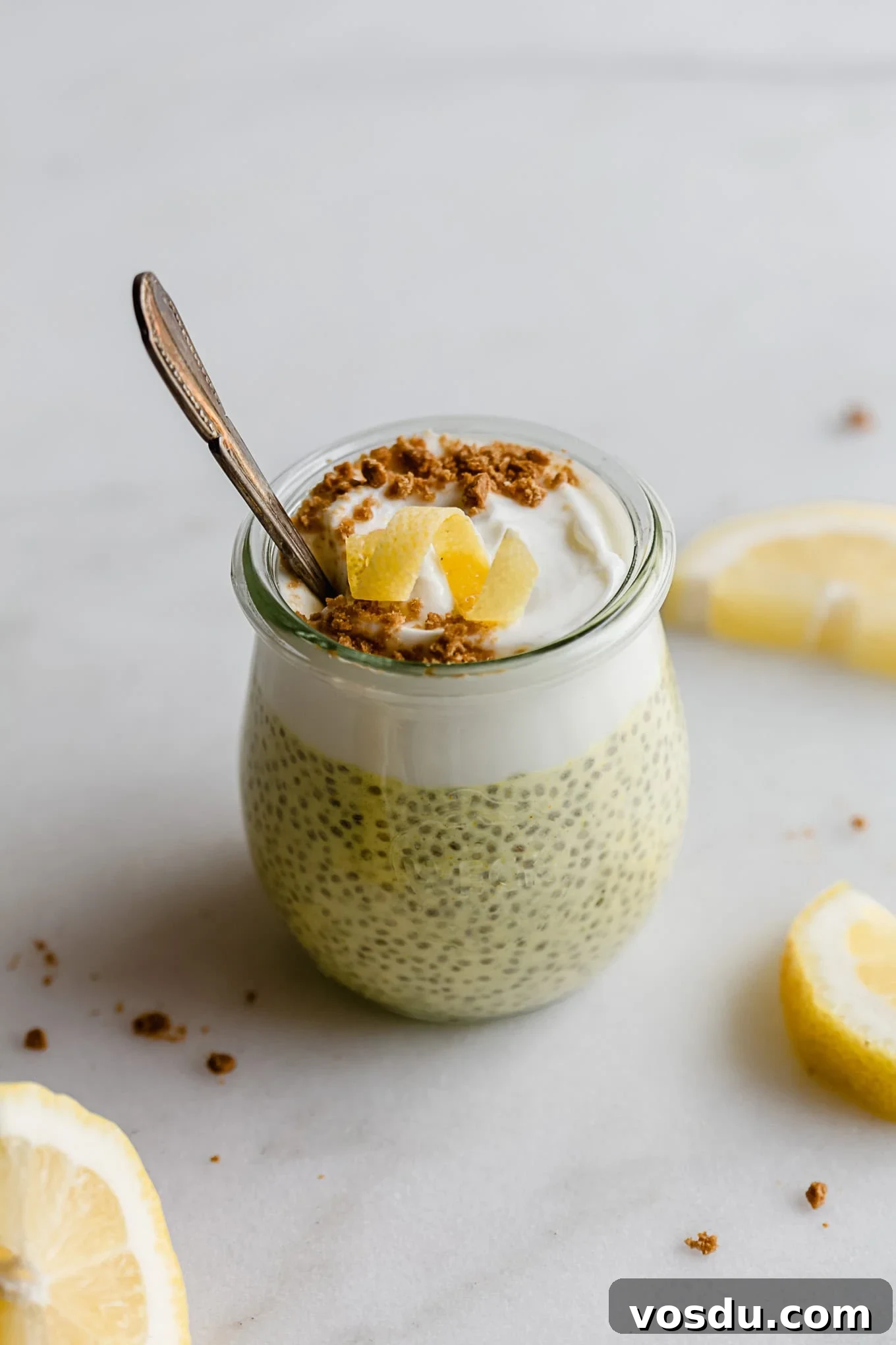 Creamy Lemon Chia Pudding Recipe for Bright Morning Meals 10 A cup of lemon chia pudding topped with yogurt and lemon zest.