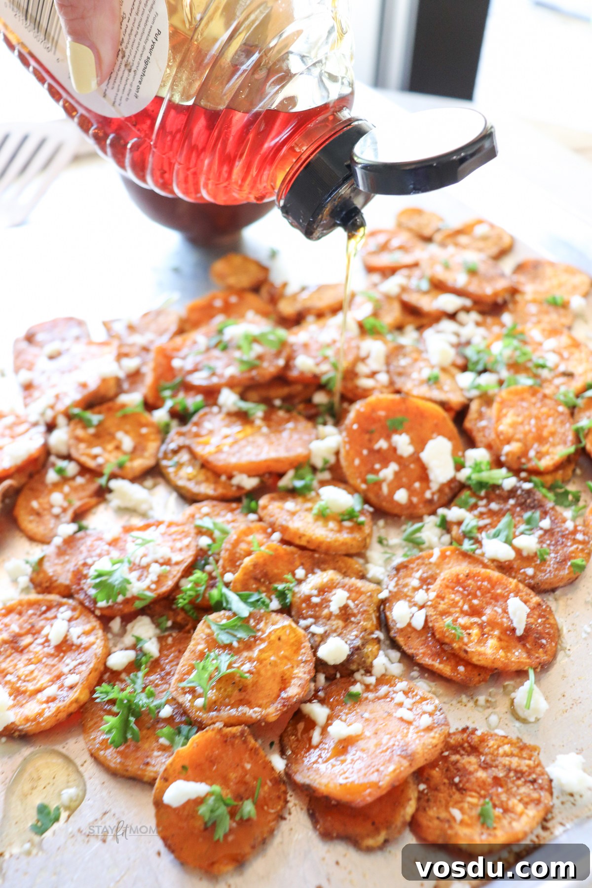 Honey-Roasted Sweet Potato Rounds with Maple Glaze 5 Honey roasted sweet potato rounds showing sweet potatoes roasted, topped with feta, and being drizzled with honey.