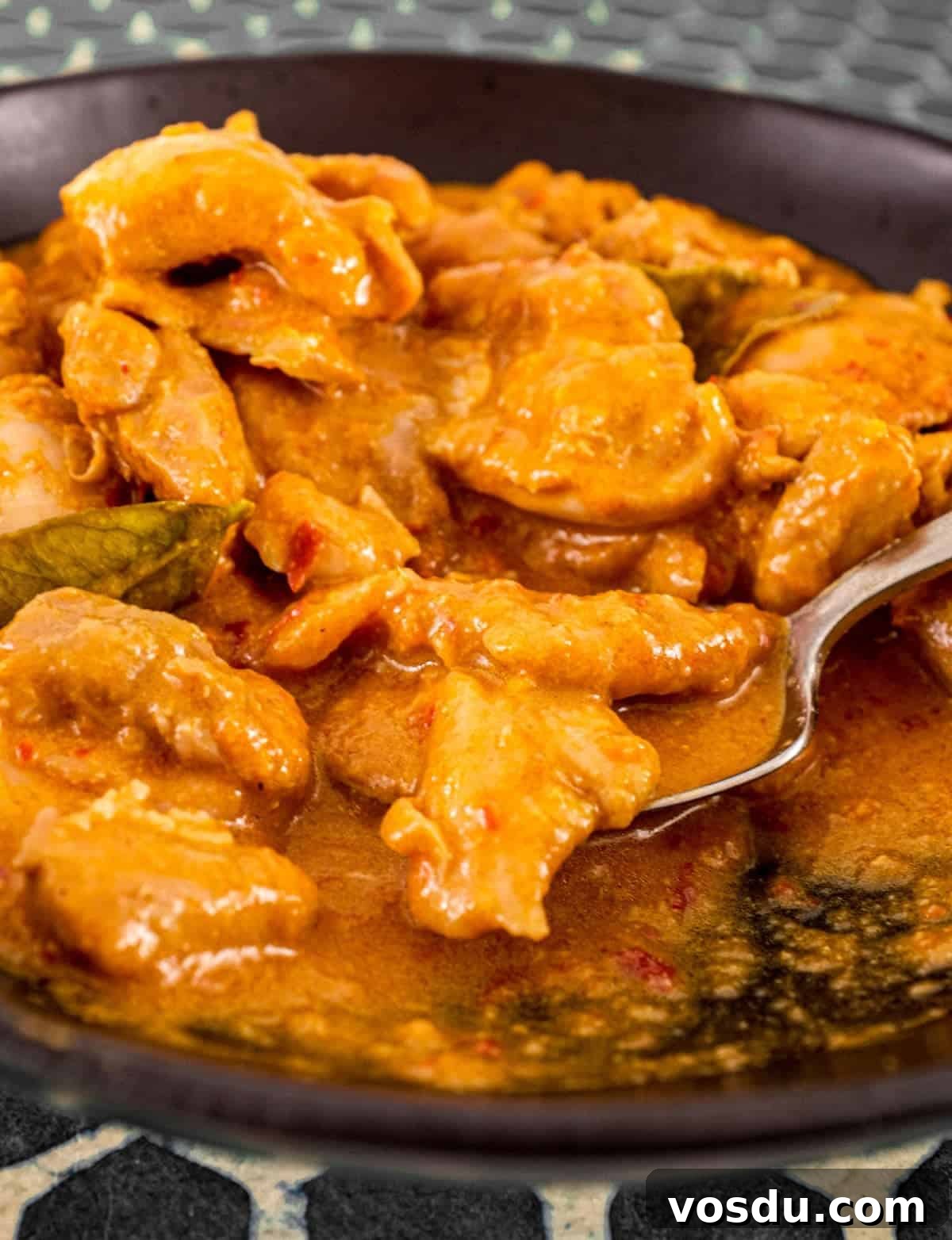 Ayam Masak Merah (Malaysian Red Chicken) | www.cookeatworld.com Chicken pieces coated in rich red sauce in ayam masak merah