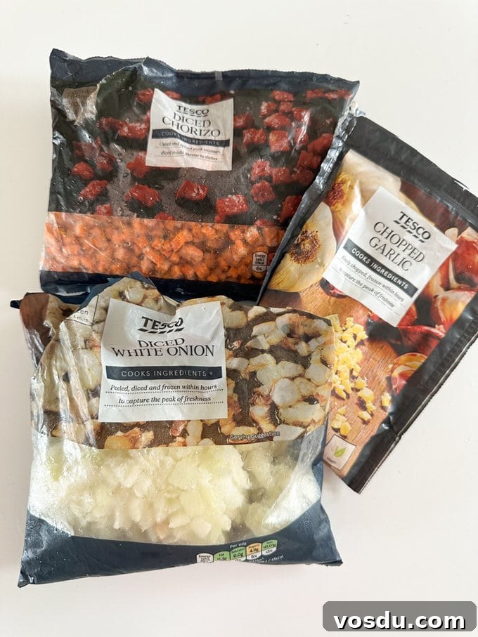 Quick 10-Minute Kids' Paella: Flavorful Family Meal 5 Paella ingredients laid out on a kitchen worktop.