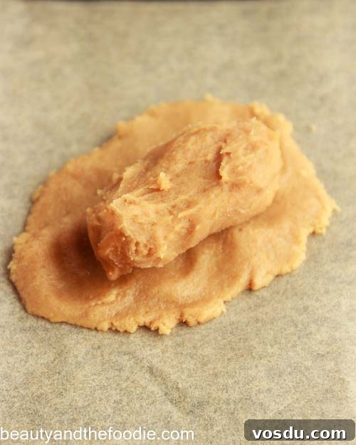 Keto Payday Candy Bar Recipe: Low-Carb Payday-Style Treat 15 Adding the caramel too the nougat.