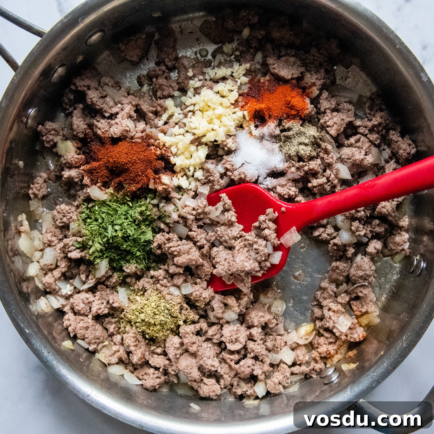 the ground beef mixture with seasonings.