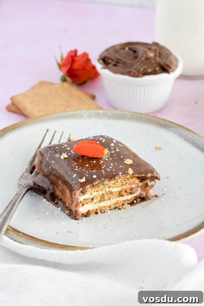 Readers' Top 10 Favorite Recipes of 2022 2 slice of no bake eclair refrigerator cake dusted with powdered sugar on white plate