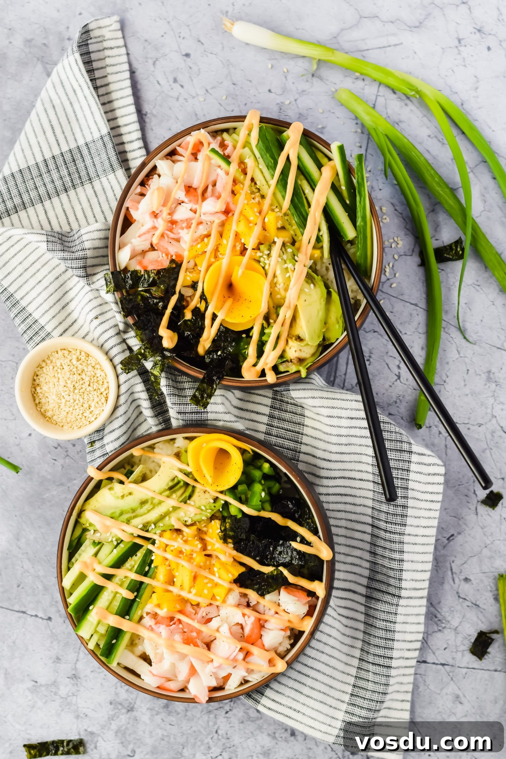 Readers' Top 10 Favorite Recipes of 2022 4 California poke bowl with rice, avocado, cucumber, mango, and crab