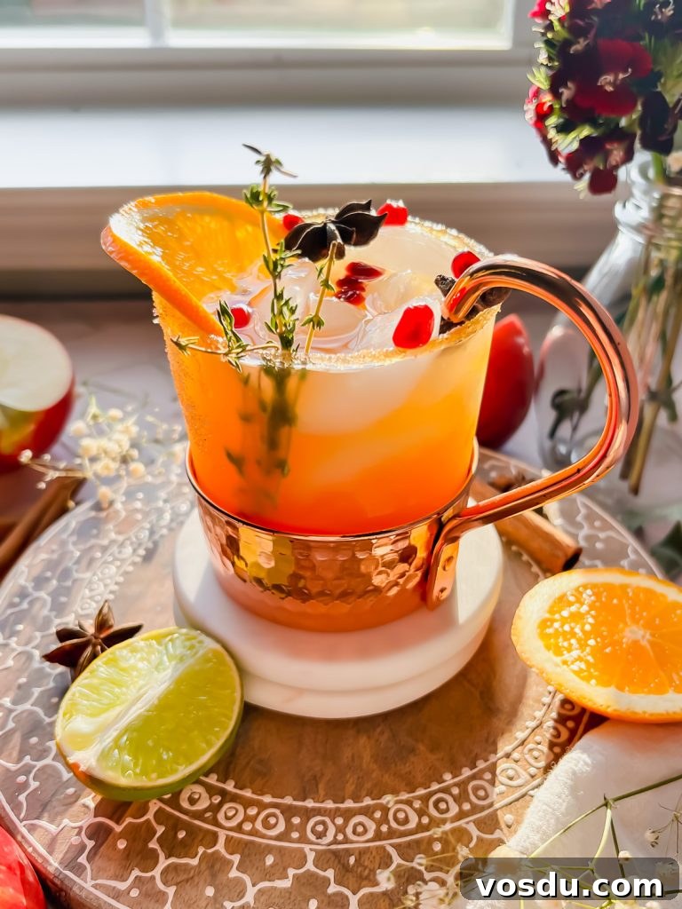 Readers' Top 10 Favorite Recipes of 2022 7 thanksgiving margarita garnished with thyme sprigs, orange slice, star anise, and pomegranate seeds
