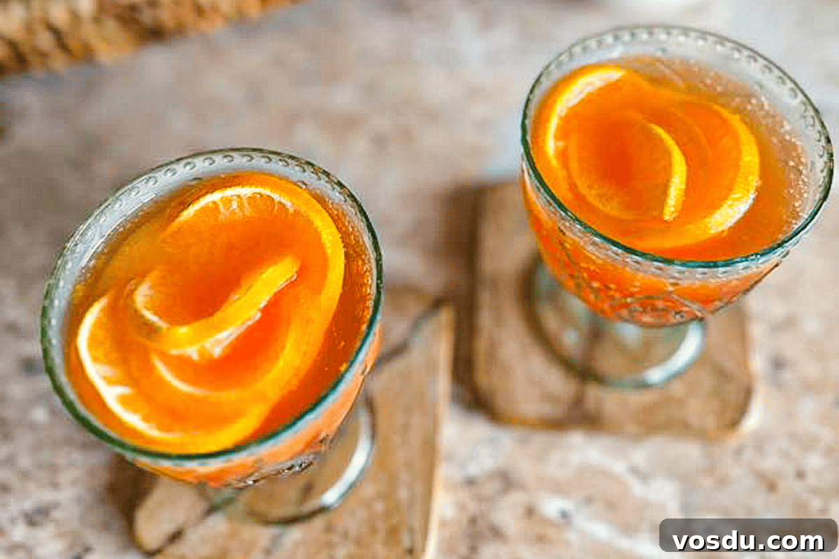 Aperol Mimosa with Frozen Orange Roses