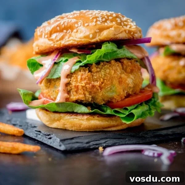 Creamy Mushroom Pasta Recipe with Garlic and Parmesan 8 Cheesy Veggie Burger with lettuce on sesame seed bun on blue background