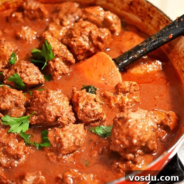Cheesy Chicken Meatball Casserole with Tomato Basil Sauce 13 Pot of meatballs with red sauce