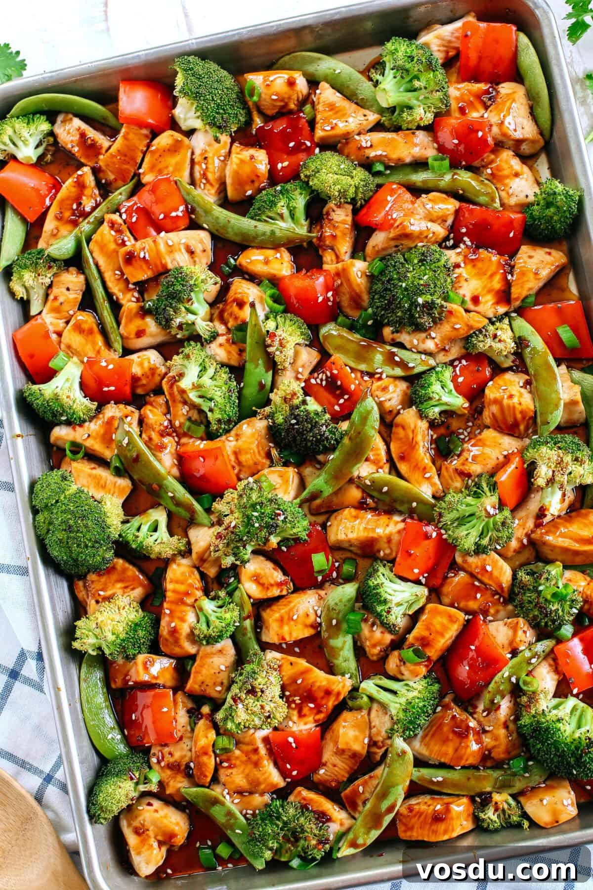 This Sheet Pan Sesame Chicken and Veggies makes the perfect weeknight dinner that’s healthy, delicious and easily made all on one pan in under 30 minutes!  Perfect recipe for your Sunday meal prep too!  