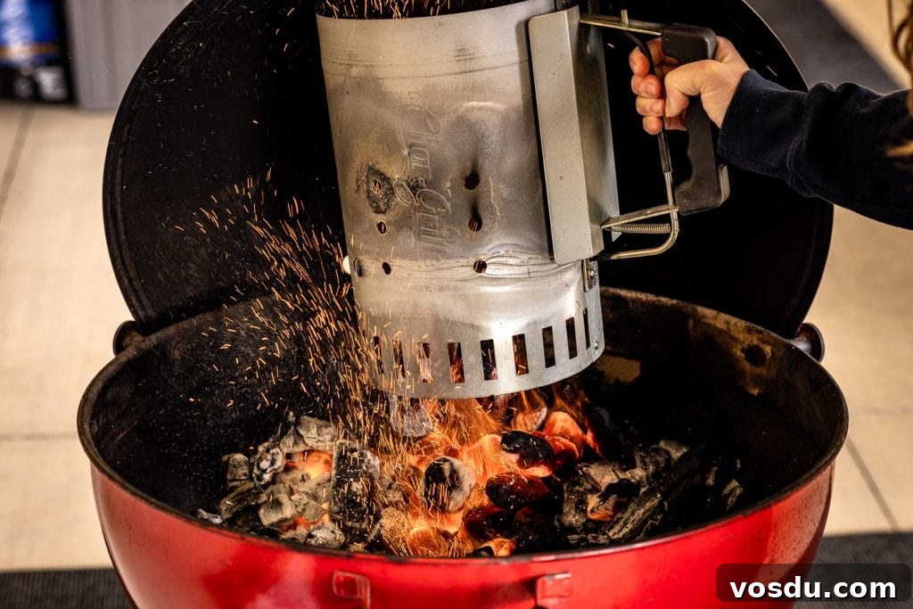 Charcoal being dumped out of a chimney.
