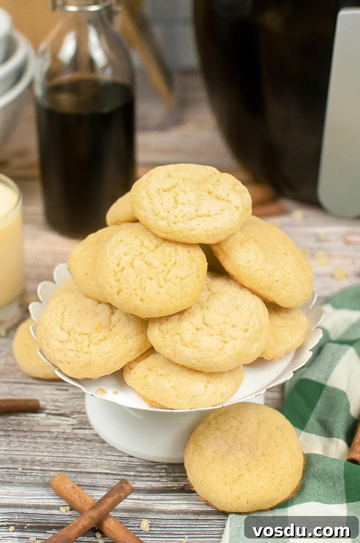 Air Fryer Eggnog Cookies Recipe for Holiday Baking 3 cake stand filled with fluffy yellow eggnog cookies