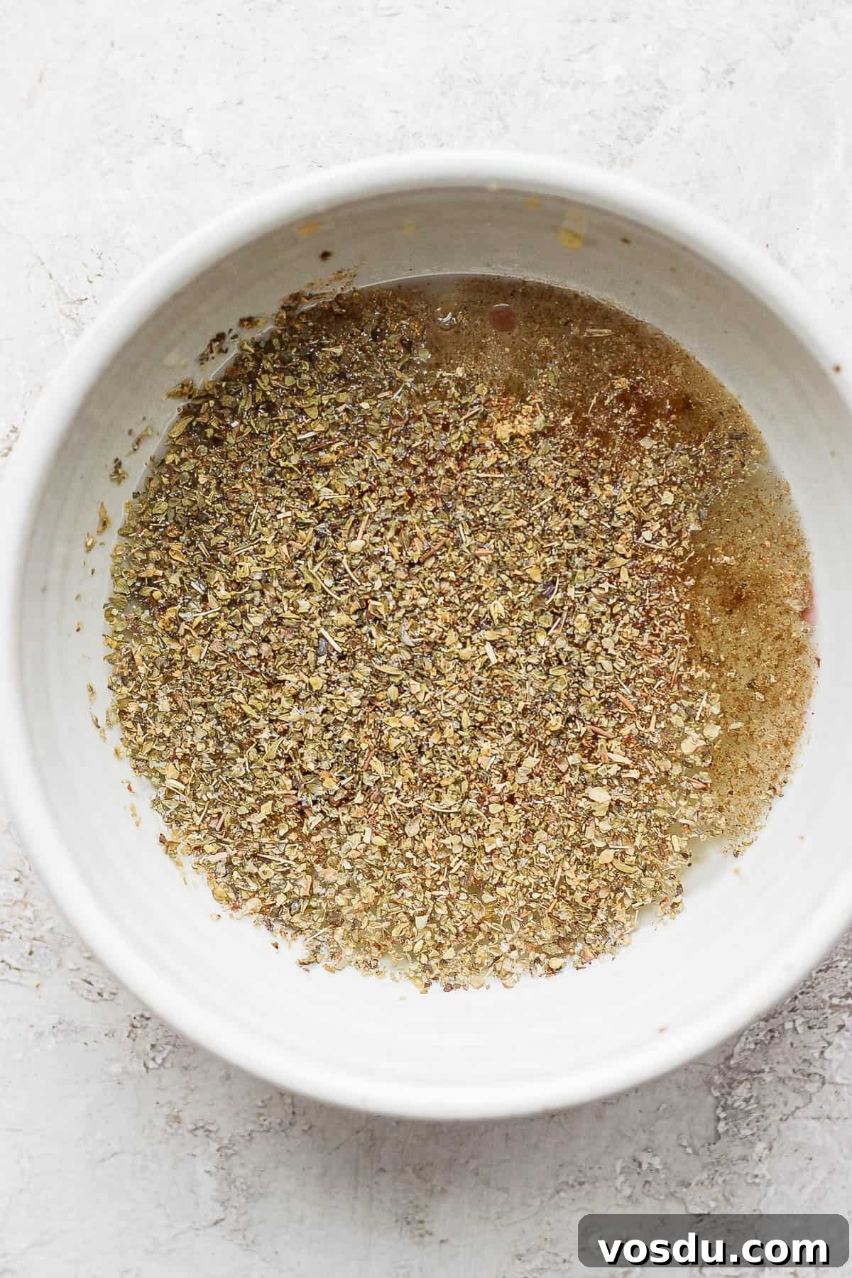 Greek-Style Chicken Marinade for Juicy, Flavorful Grilled Chicken 4 All of the marinade ingredients in a small mixing bowl.