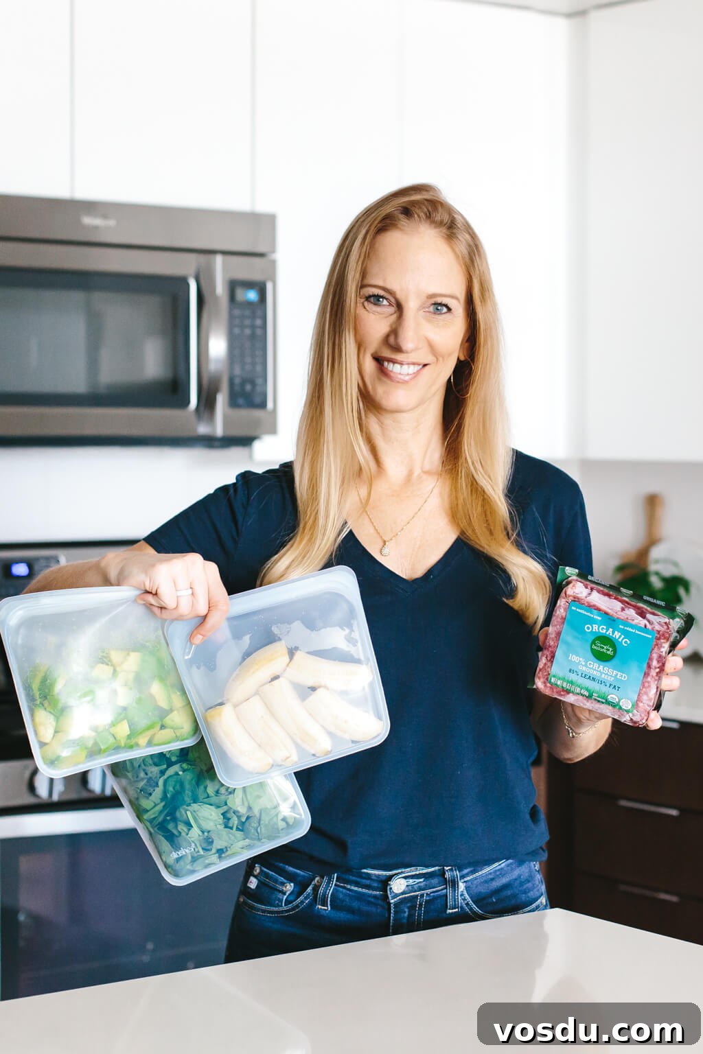 10 tips for eating healthy on a budget! Make good food tasty and budget friendly. Girl holding budget friendly healthy food.