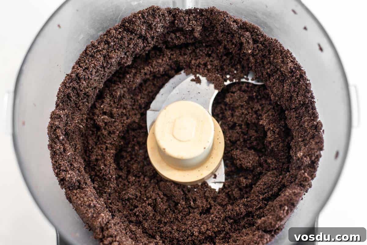 Decadent Oreo Cookie Tart Recipe 4 Oreos pulsed in food processor.
