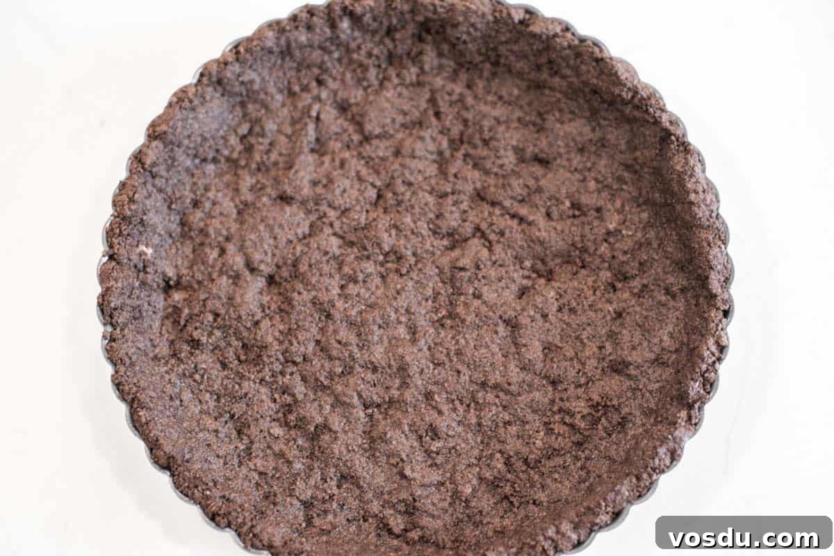 Decadent Oreo Cookie Tart Recipe 6 Oreo crust baked in tart pan.