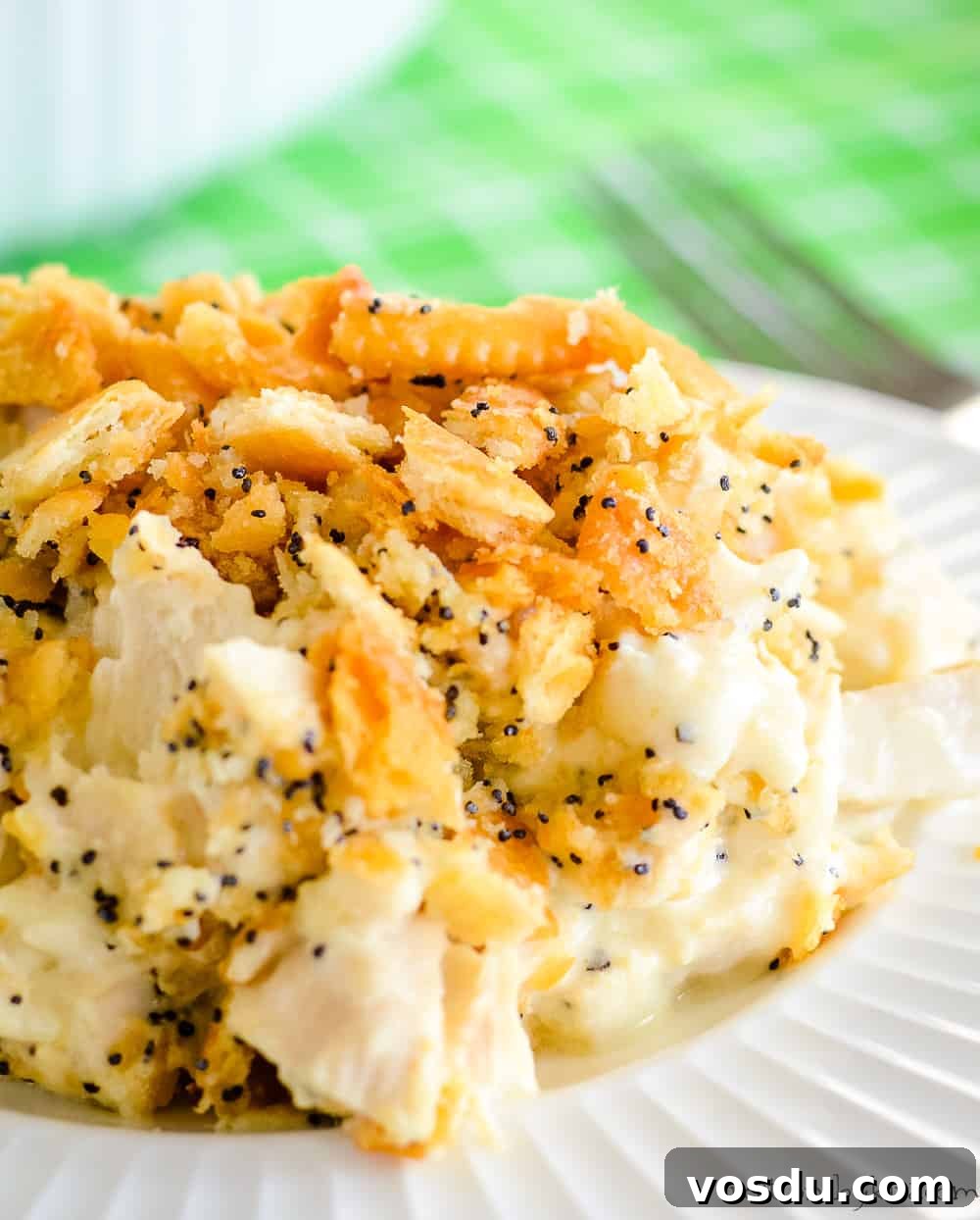 Recipe for Poppy Seed Chicken - this rich and creamy chicken casserole is a favorite dinner recipe that everyone loves! close up of poppy seed chicken casserole