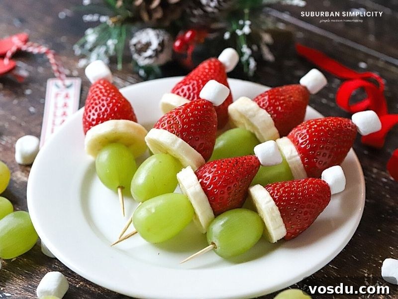 Festive Christmas Fruit Kabobs: Colorful Holiday Skewers 5 grinch kababs on a plate