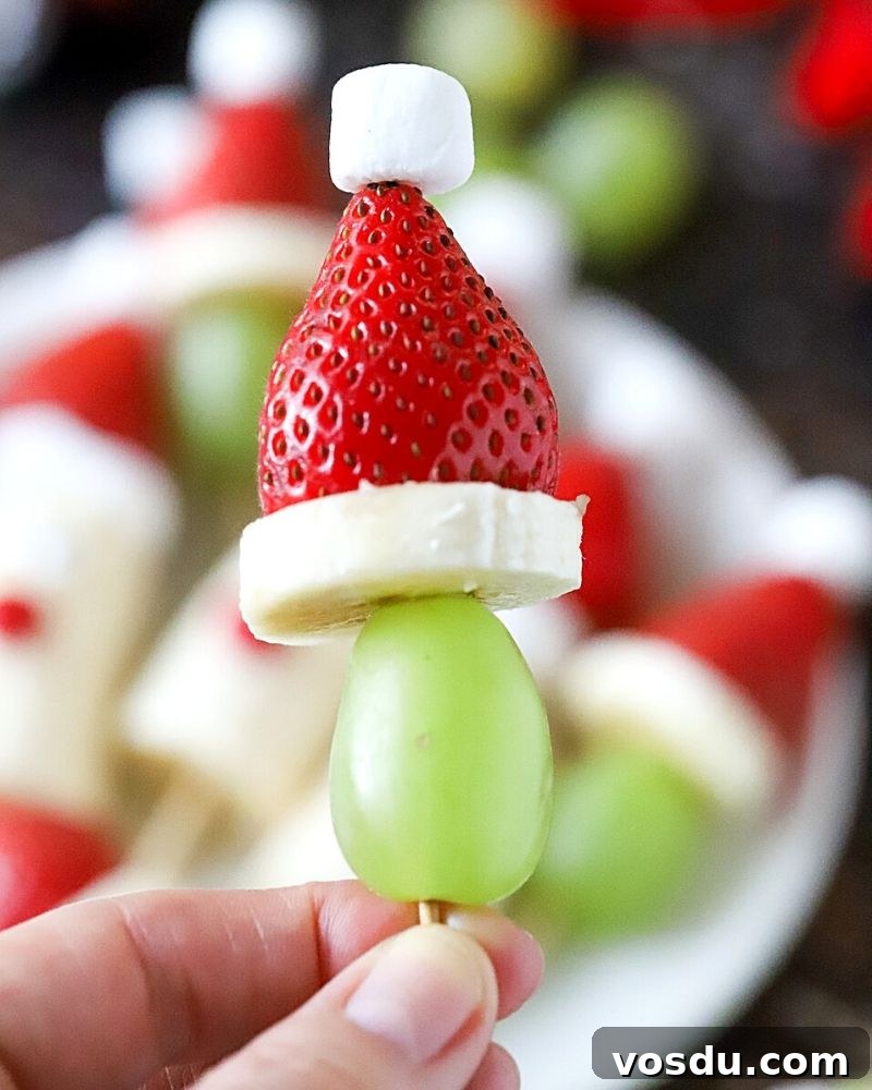Festive Christmas Fruit Kabobs: Colorful Holiday Skewers 6 Grinch Kabobs close up