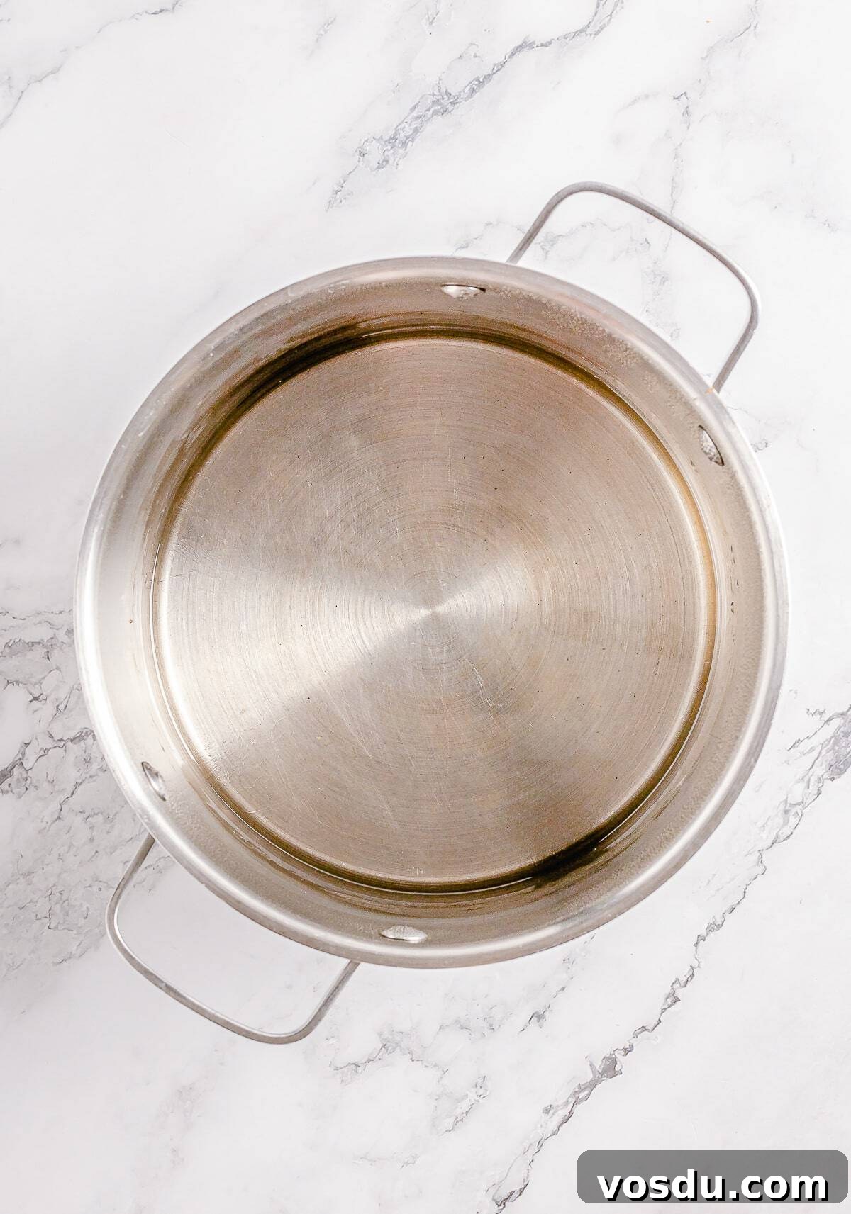 Finished simple syrup in a saucepan