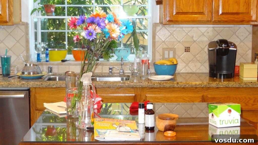Kitchen Table Before 100 Club Clutter Challenge Colorful flower bouquet on kitchen counter with coffee maker and fruit bowl.