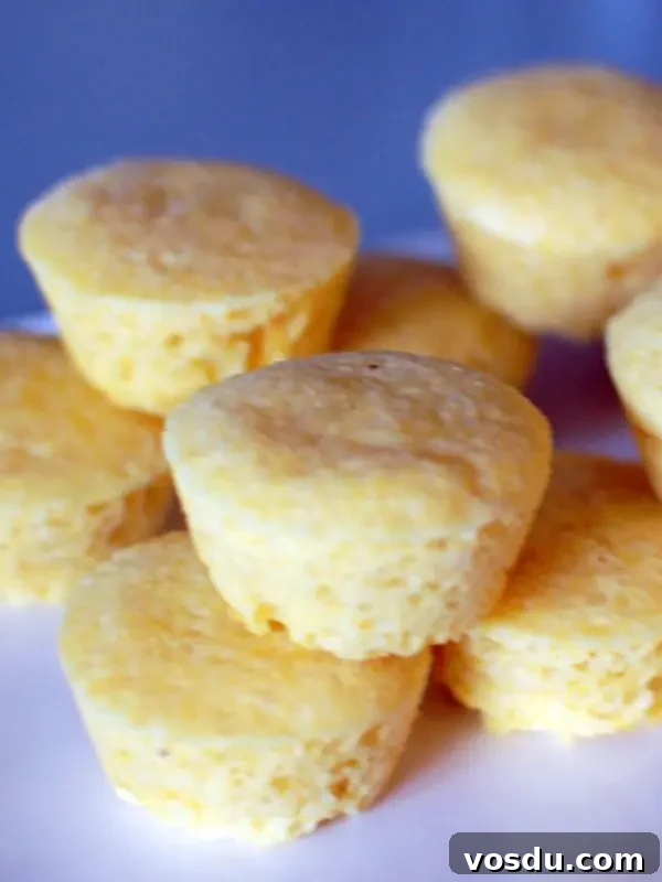 Vegan Goat Cheese Corn Muffins @spabettie #vegan #glutenfree #muffin Vegan Goat Cheese Corn Muffins stacked on a platter