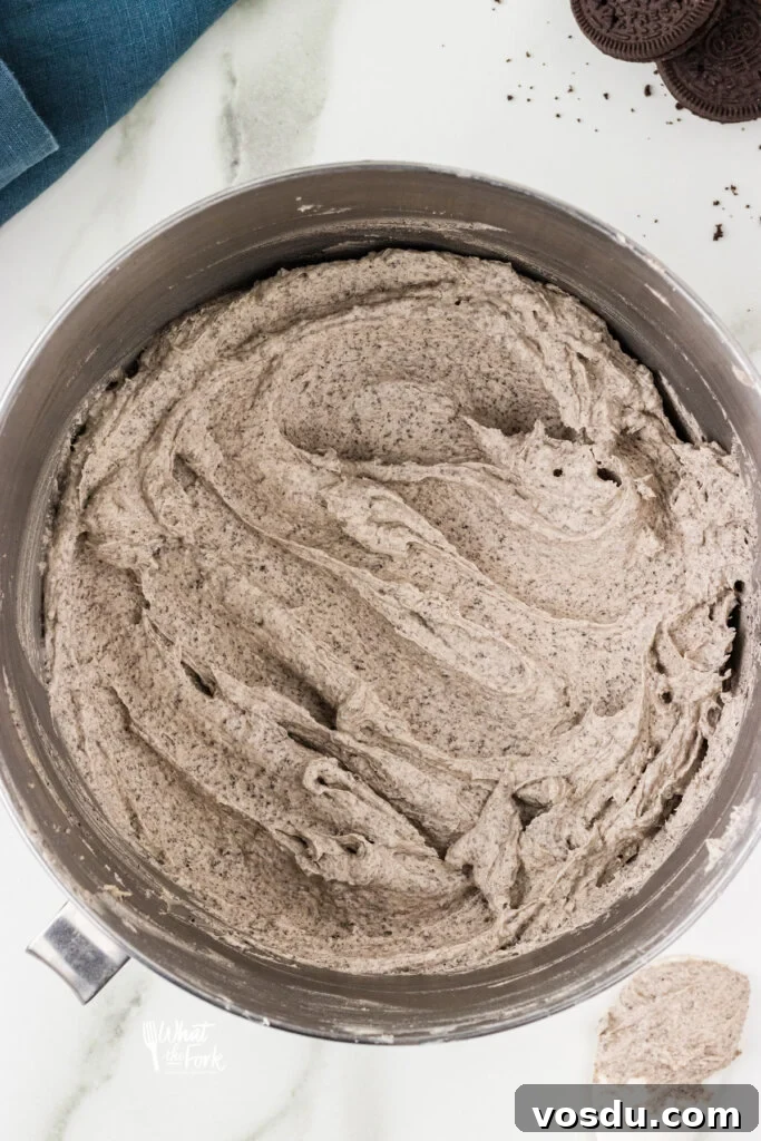 Cookies and Cream Frosting Recipe made in a large silver bowl