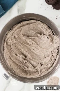 Cookies and Cream Frosting Recipe made in a large silver bowl