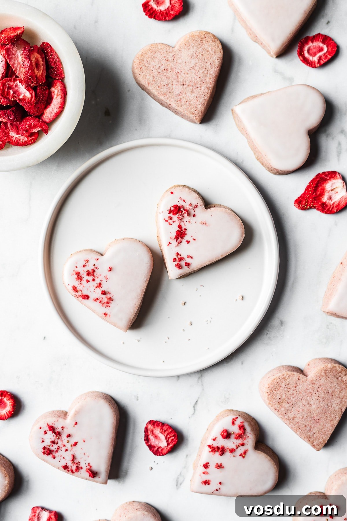 Strawberry Shortbread Cookies Recipe — Simple Homemade Treat 17 Glazed heart shaped strawberry shortbread cookies.