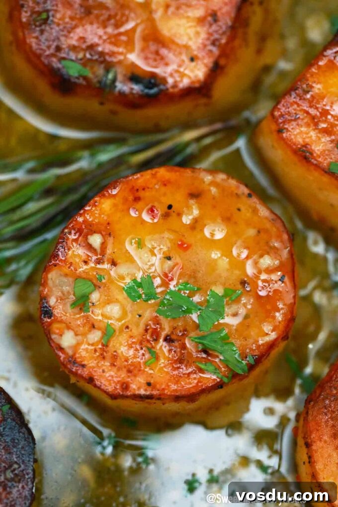 Perfect Fondant Potatoes Recipe: Crispy Edges, Tender Centers 2 fondant potatoes with rosemary