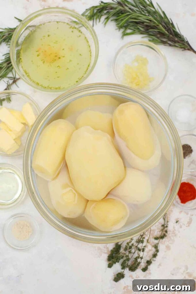 Perfect Fondant Potatoes Recipe: Crispy Edges, Tender Centers 3 fondant potatoes ingredients in bowls on a table
