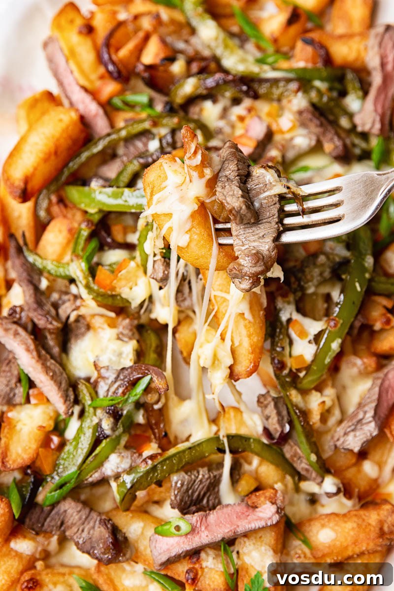 Loaded Philly Cheesesteak Fries: Steak, Cheese & Onions 3 French Fries topped with steak strips, green peppers, onions and melted cheese.