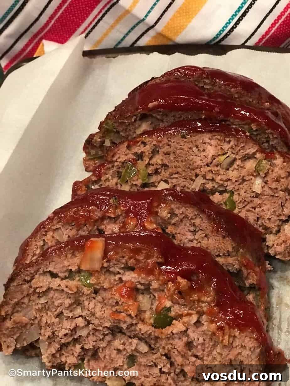 How To Properly Thaw Beef, Pork, Poultry and Seafood Sliced meatloaf with tomato sauce on a white platter