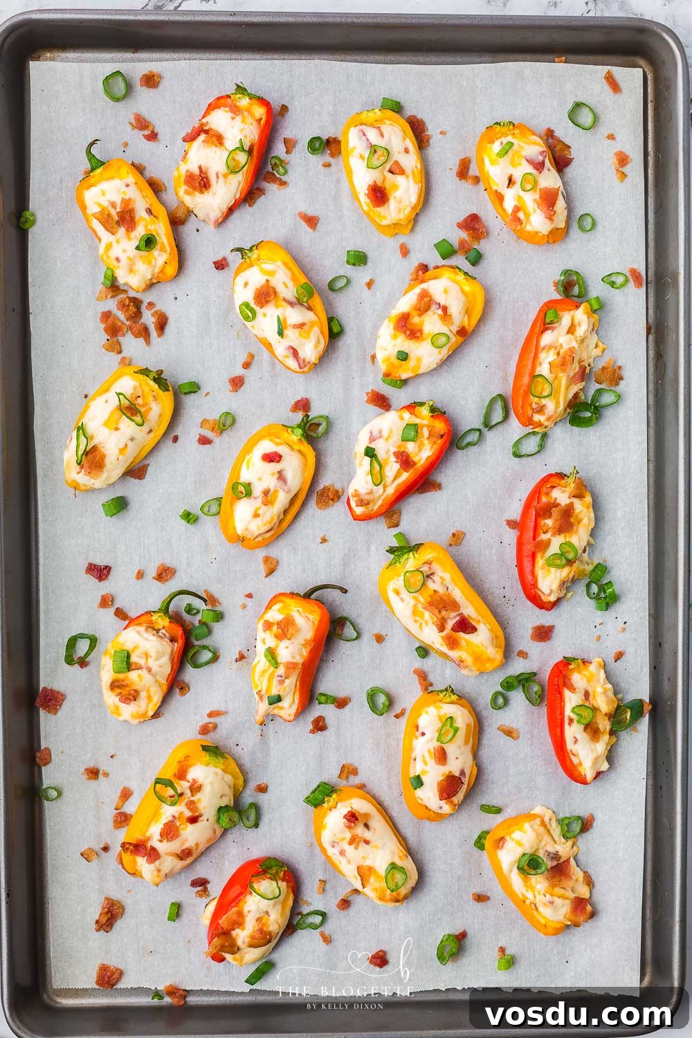 Stuffed Mini Peppers with Cream Cheese and Herbs 9 Stuffed peppers on baking sheet