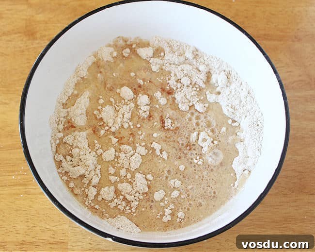 Moist Carrot Muffins with Cinnamon and Maple Glaze 7 Unmixed muffin batter in a large white bowl.