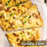 A top down view of sliced flammkuchen.