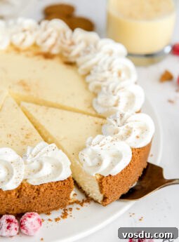 Classic Bûche de Noël Recipe: Traditional French Yule Log Cake 10 cake server taking slice of cheesecake from plate