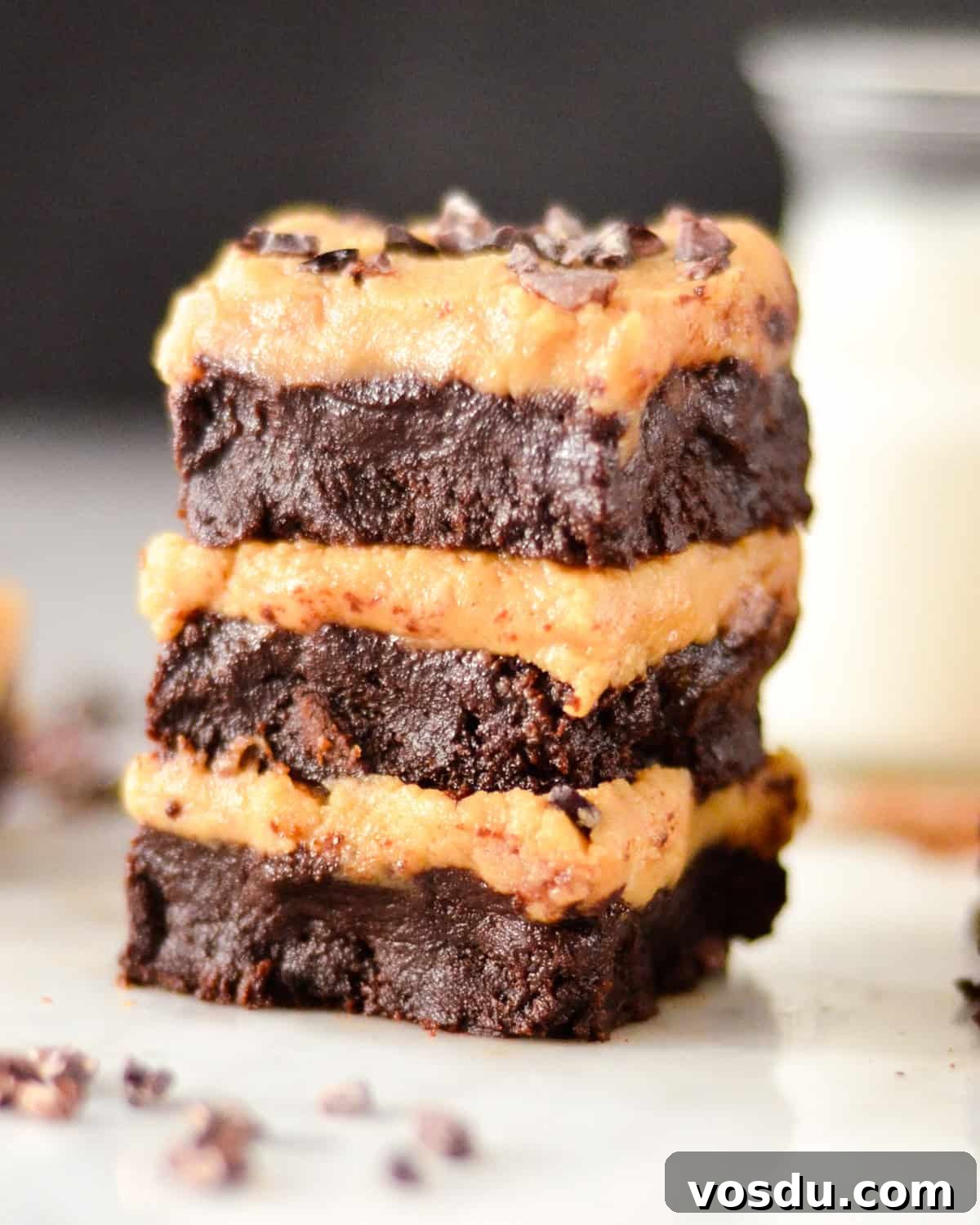 Flourless Peanut Butter Brownies Recipe — Fudgy & Gluten-Free 12 a stack of 3 Flourless Peanut Butter Brownies with peanut butter frosting