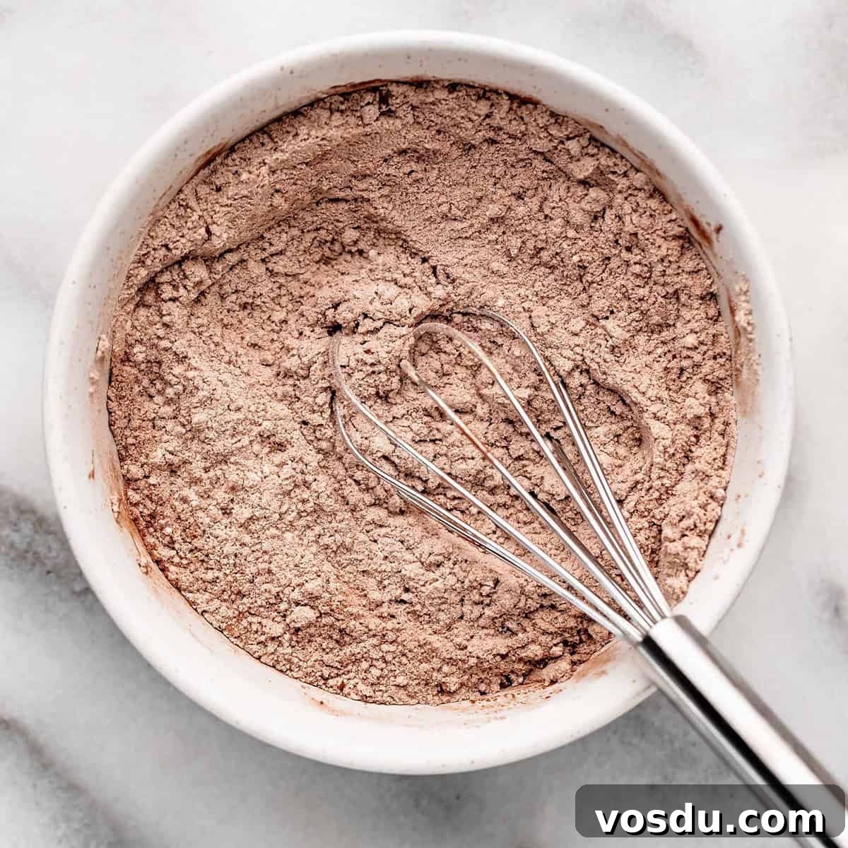 Flourless Peanut Butter Brownies Recipe — Fudgy & Gluten-Free 5 How to Make Flourless Peanut Butter Brownies dry ingredients whisked in a bowl