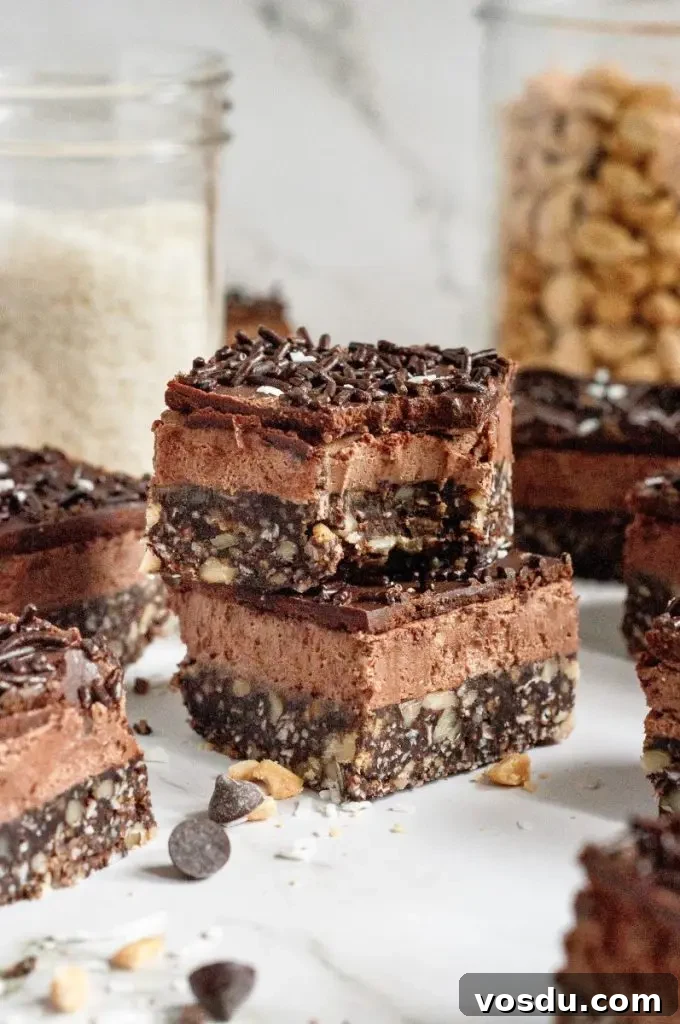 Gluten-Free Vegan No-Bake Chocolate Bars Recipe 2 No-bake chocolate bars are dessert squares made up of three rich dark chocolate layers and topped with chocolate sprinkles and bright white shredded coconut.