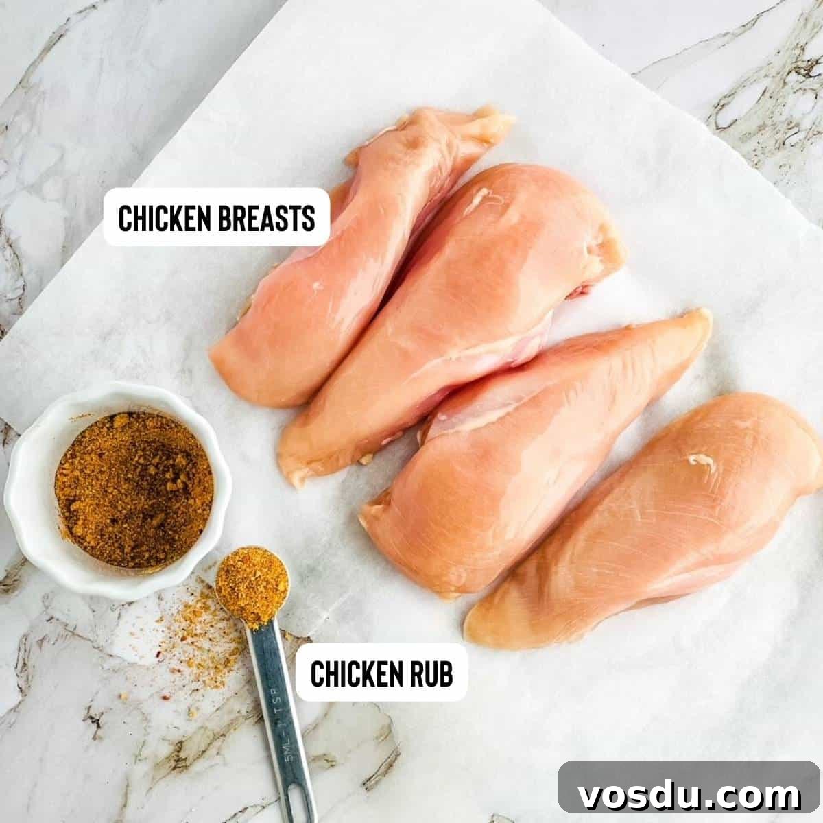 Instant Pot Frozen Chicken Breast: Juicy Chicken in 30 Minutes 3 Ingredients for frozen chicken breast in instant pot on a white countertop.