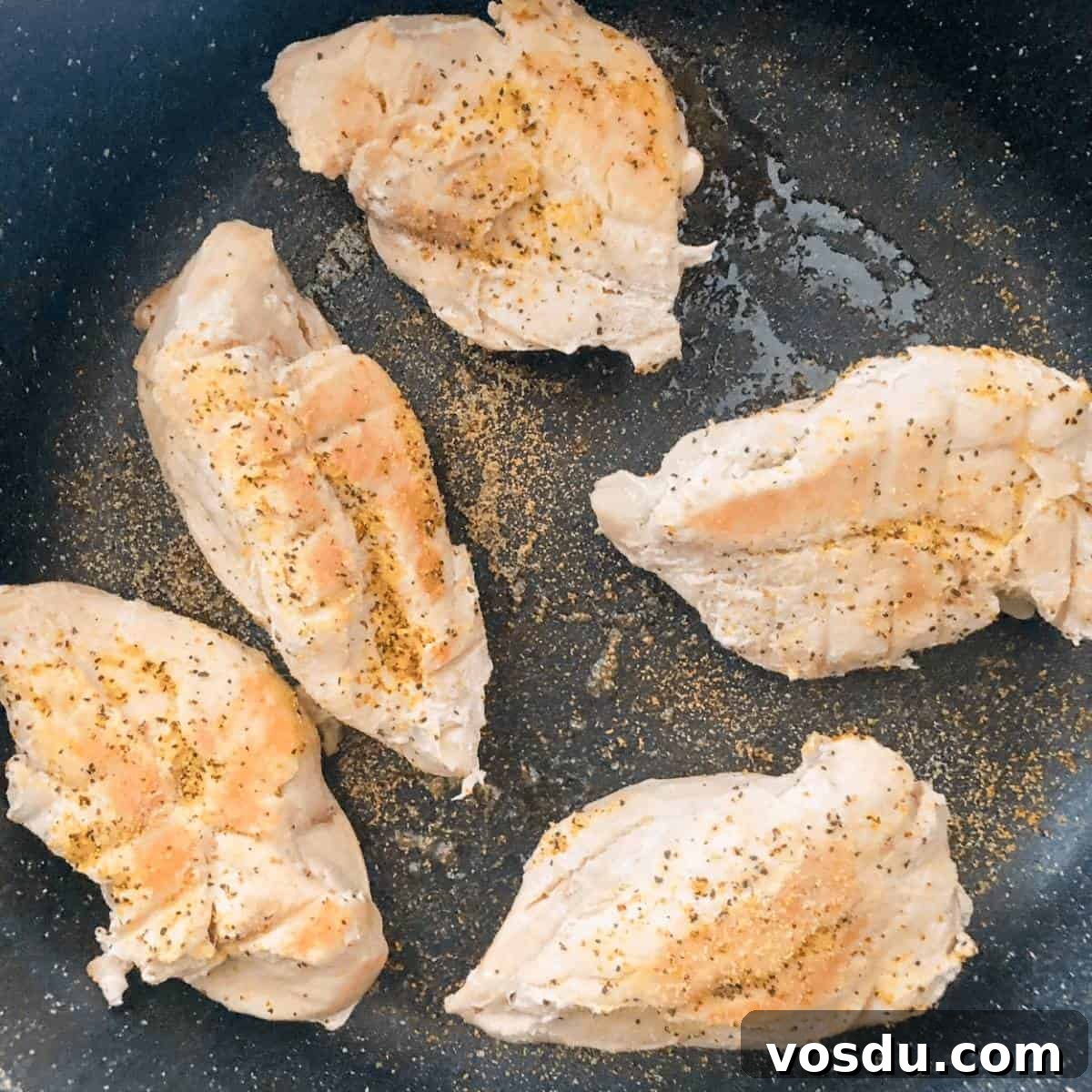 Instant Pot Frozen Chicken Breast: Juicy Chicken in 30 Minutes 6 Seared chicken breasts in a large skillet.