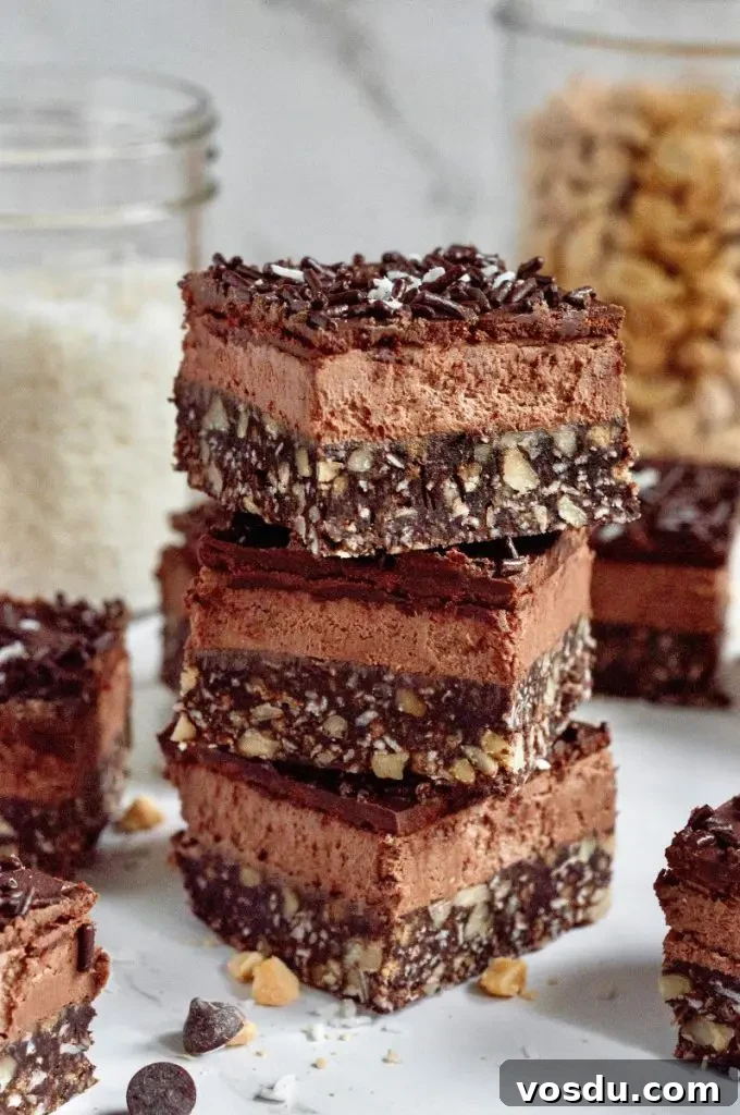 Gluten-Free Vegan No-Bake Chocolate Bars Recipe 6 No-bake chocolate bars are dessert squares made up of three rich dark chocolate layers and topped with chocolate sprinkles and bright white shredded coconut.