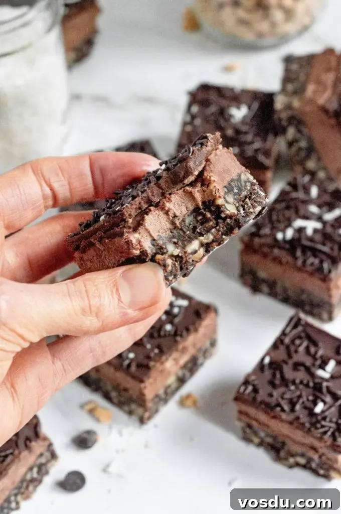 Gluten-Free Vegan No-Bake Chocolate Bars Recipe 7 No-bake chocolate bars are dessert squares made up of three rich dark chocolate layers and topped with chocolate sprinkles and bright white shredded coconut.