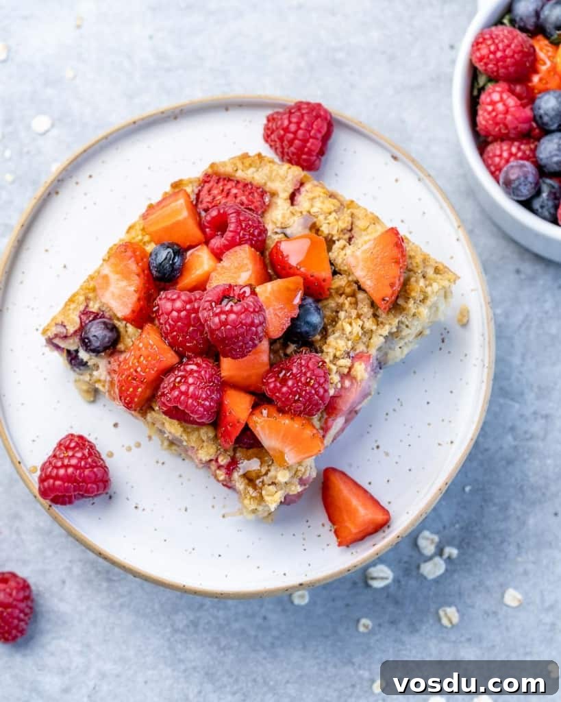 top view of a slice if baked oatmeal on a white plate 