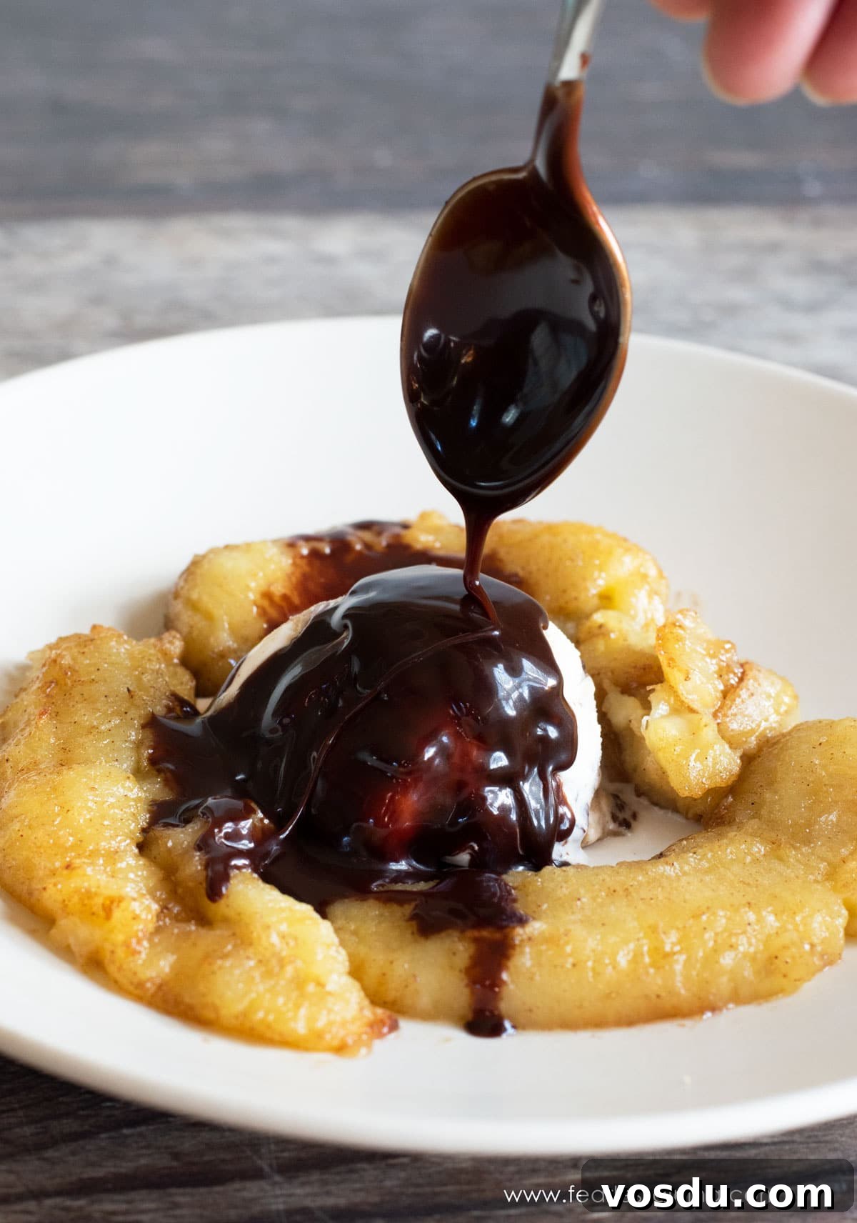 Crispy Caramelized Bananas in the Air Fryer: Quick Recipe 2 Drizzling hot fudge over caramelized air fryer bananas and ice cream.