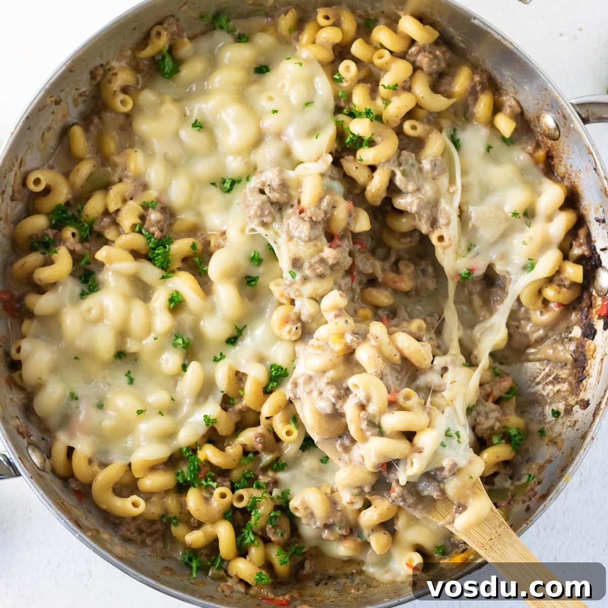 One-Pot Philly Cheesesteak Pasta Recipe for Fast Weeknight Dinner 11 Overhead view of cheesesteak pasta with cheese melted on top.