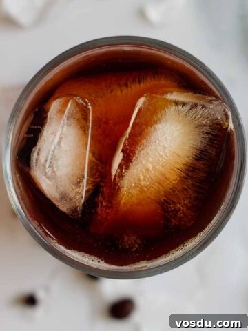 cold brew coffee in a glass full with ice seen from above